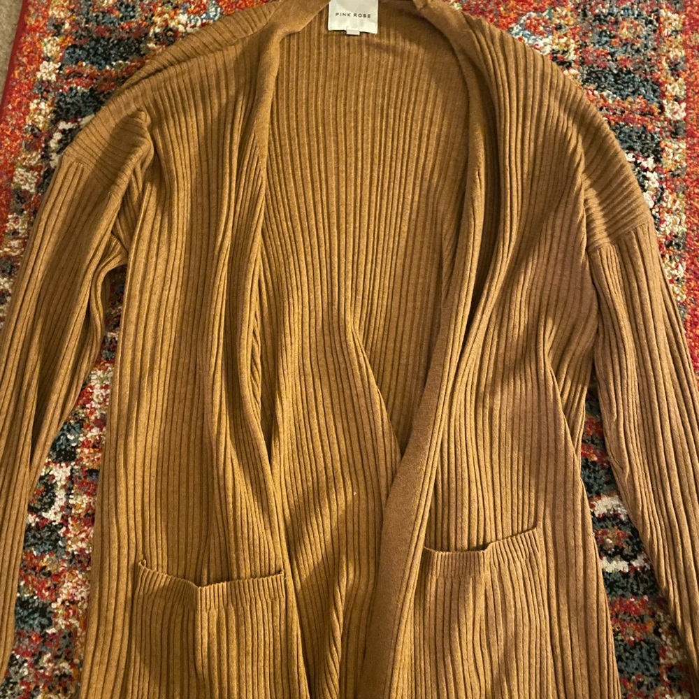 Womens brown cardigan with two front pockets. Size L.
